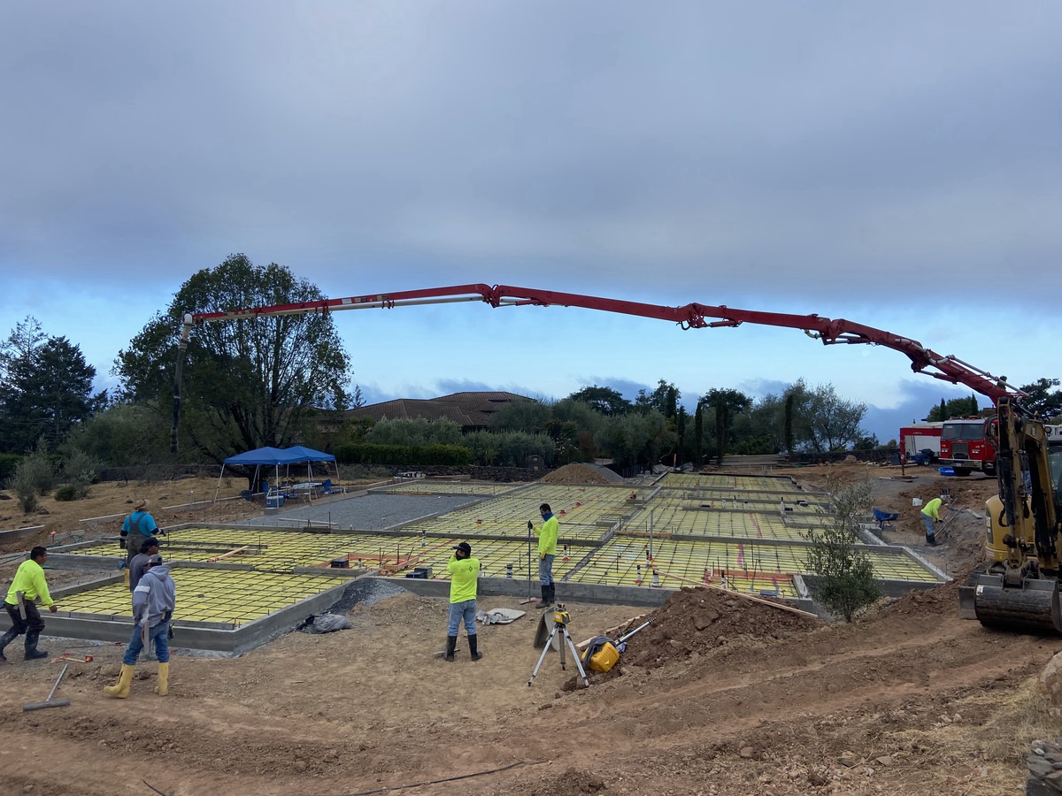 concrete truck moving locations to pour concrete