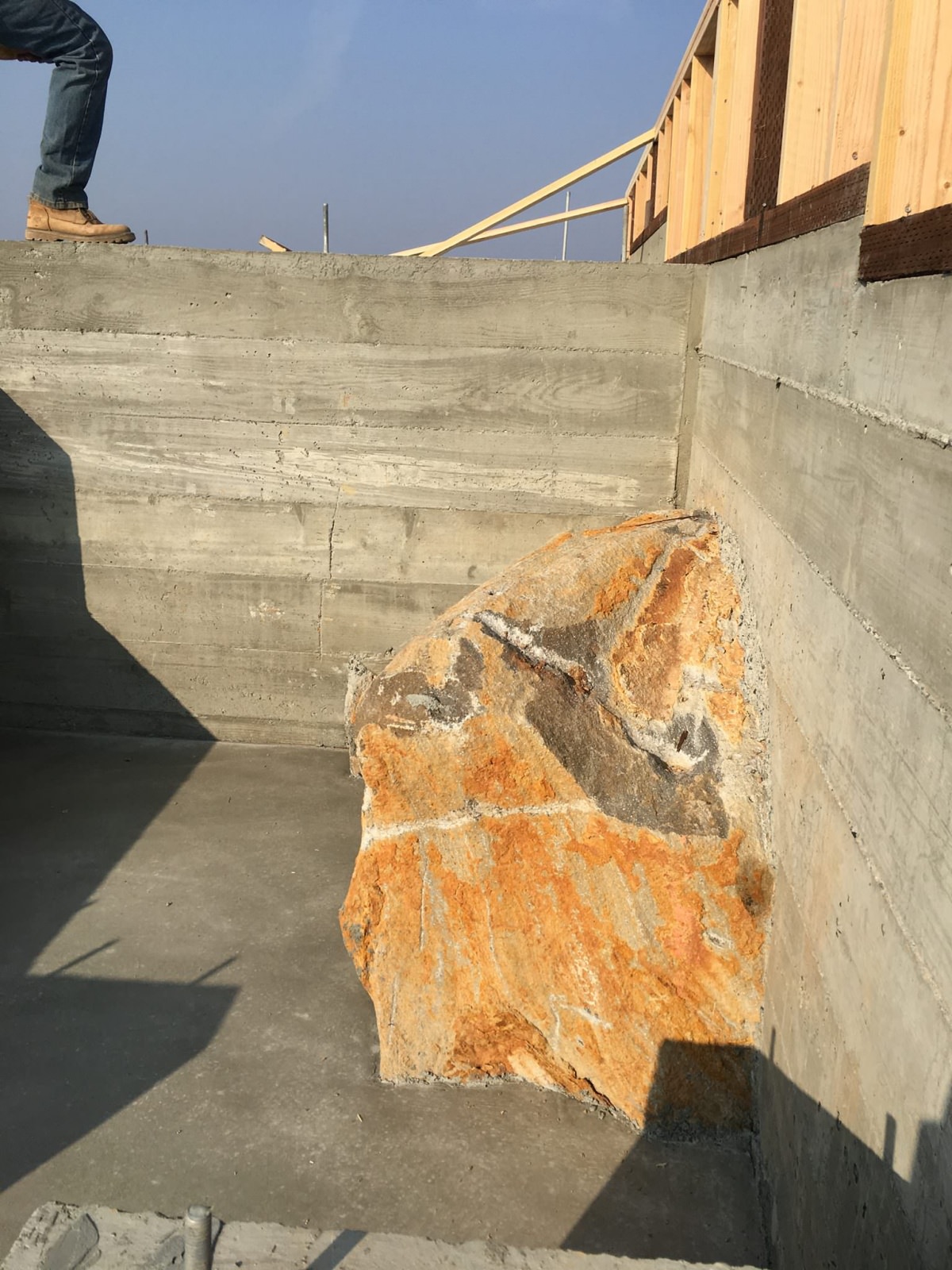 close up of stone built into home foundation